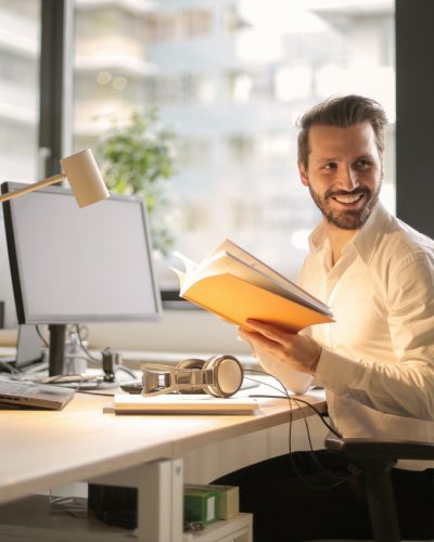 photo-of-man-holding-a-book-927022 photo-of-man-holding-a-book-927022