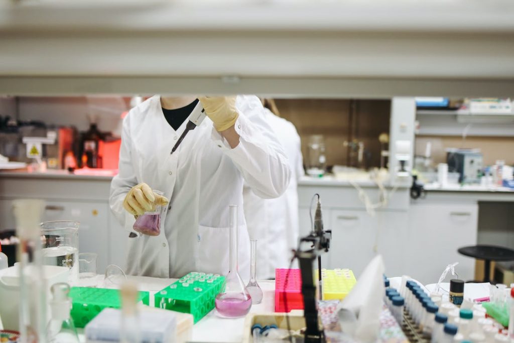 Researcher Working on a Sample in a Laboratory